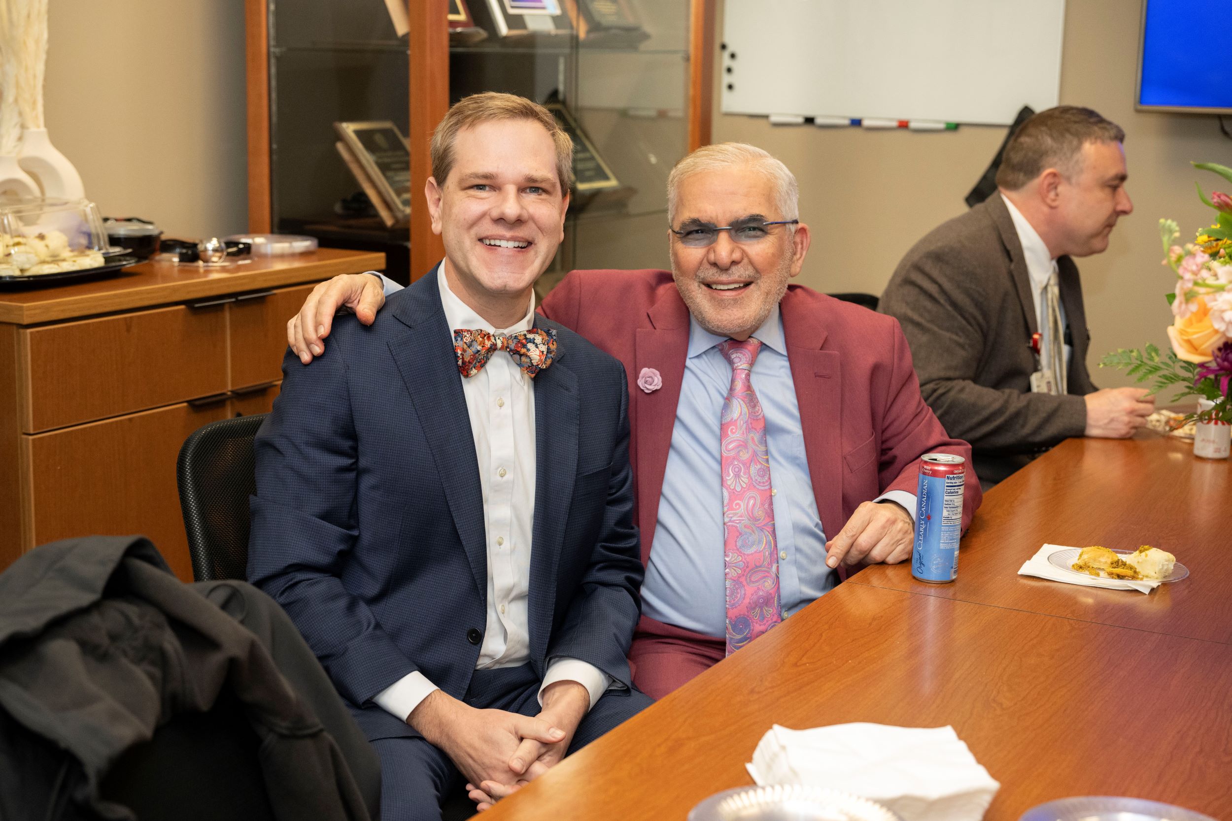 Jeffrey Strawn and Henry Nasrallah smiling.